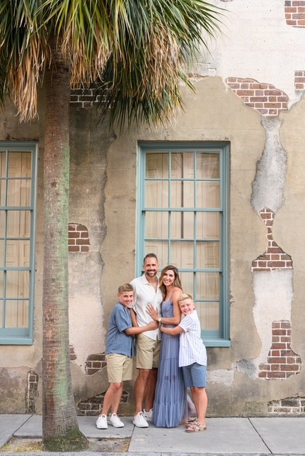 Mark Greaves with his wife and two sons